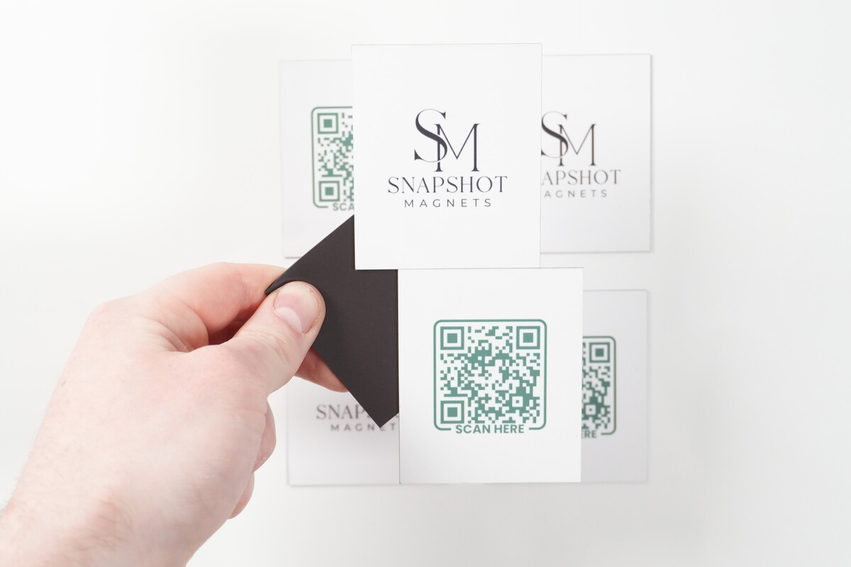 Branded business magnets — hand-held front/back