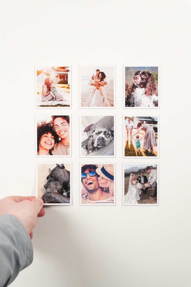 9-pack photo magnets on a wall